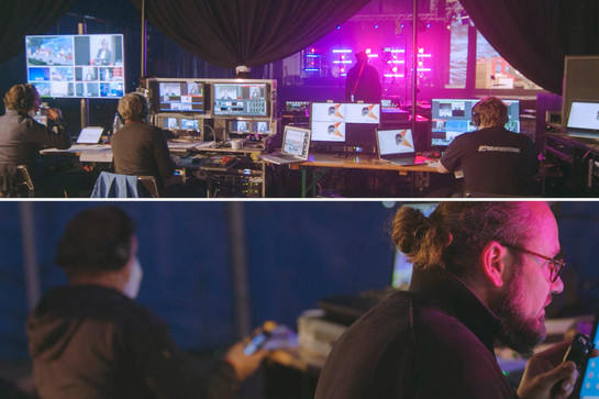 Einblicke in ein Studio, in dem drei Personen und viele Bildschirme sind. 
