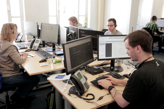 TDC Mitarbeiter während der Arbeit
