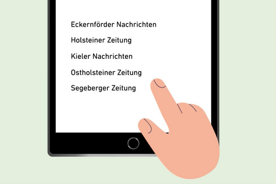Eine Hand schwebt über einem Ipad