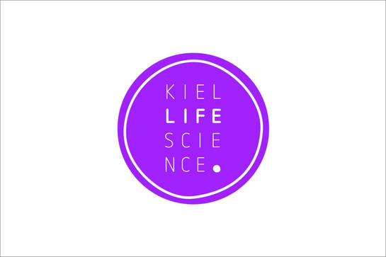Ein Logo: Ein lilafarbener Kreis mit der Inschrift „Kiel Life Science“.