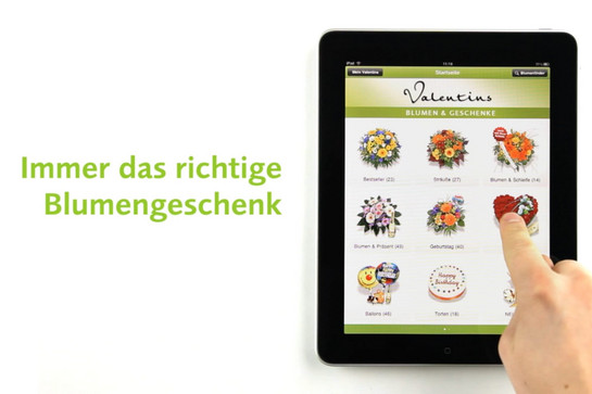 Eine Person surft auf der Homepage von Valentins Blumen und Geschenke