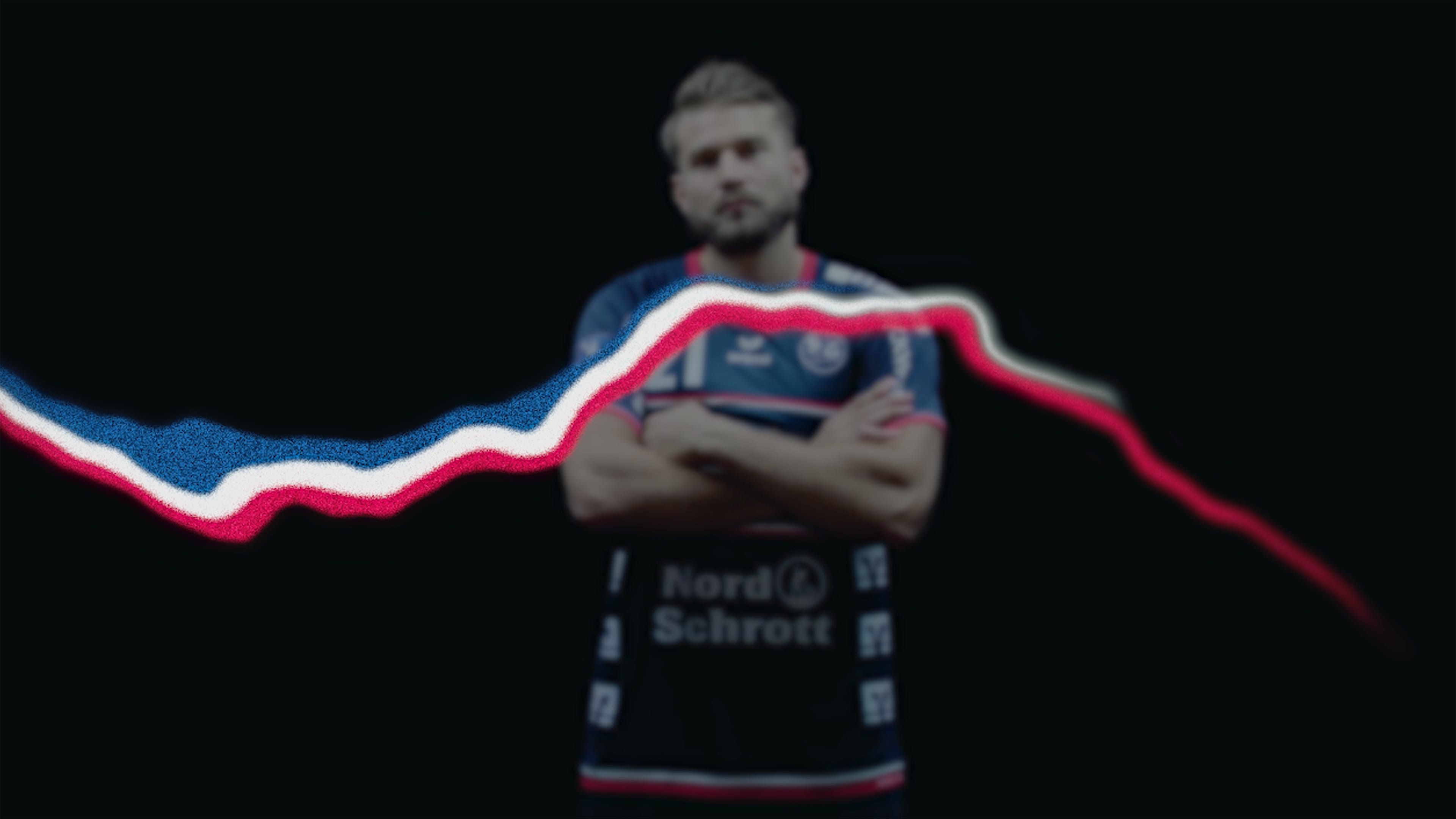 Ein SG Spieler verschränkt die Arme vor der Kamera